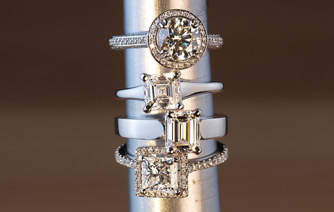Four stacked engagement rings
