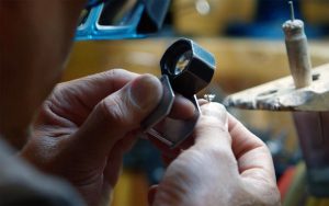 Close up of jeweler at a bench