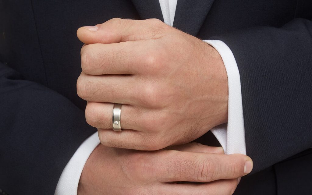 Groom with his wedding ring