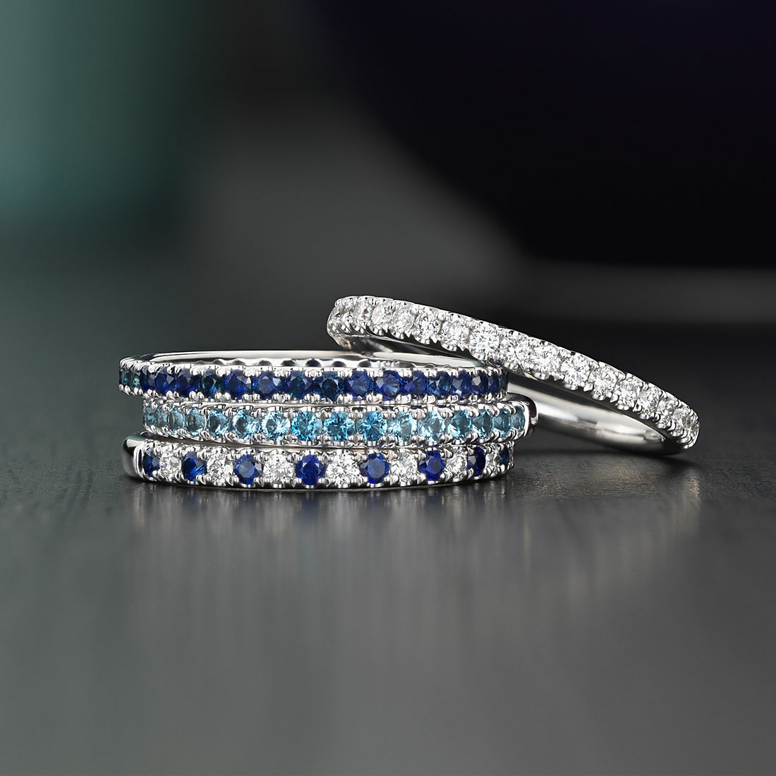 Stack of diamond and gemstone rings