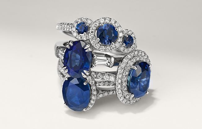 Stack of sapphire and diamond rings.