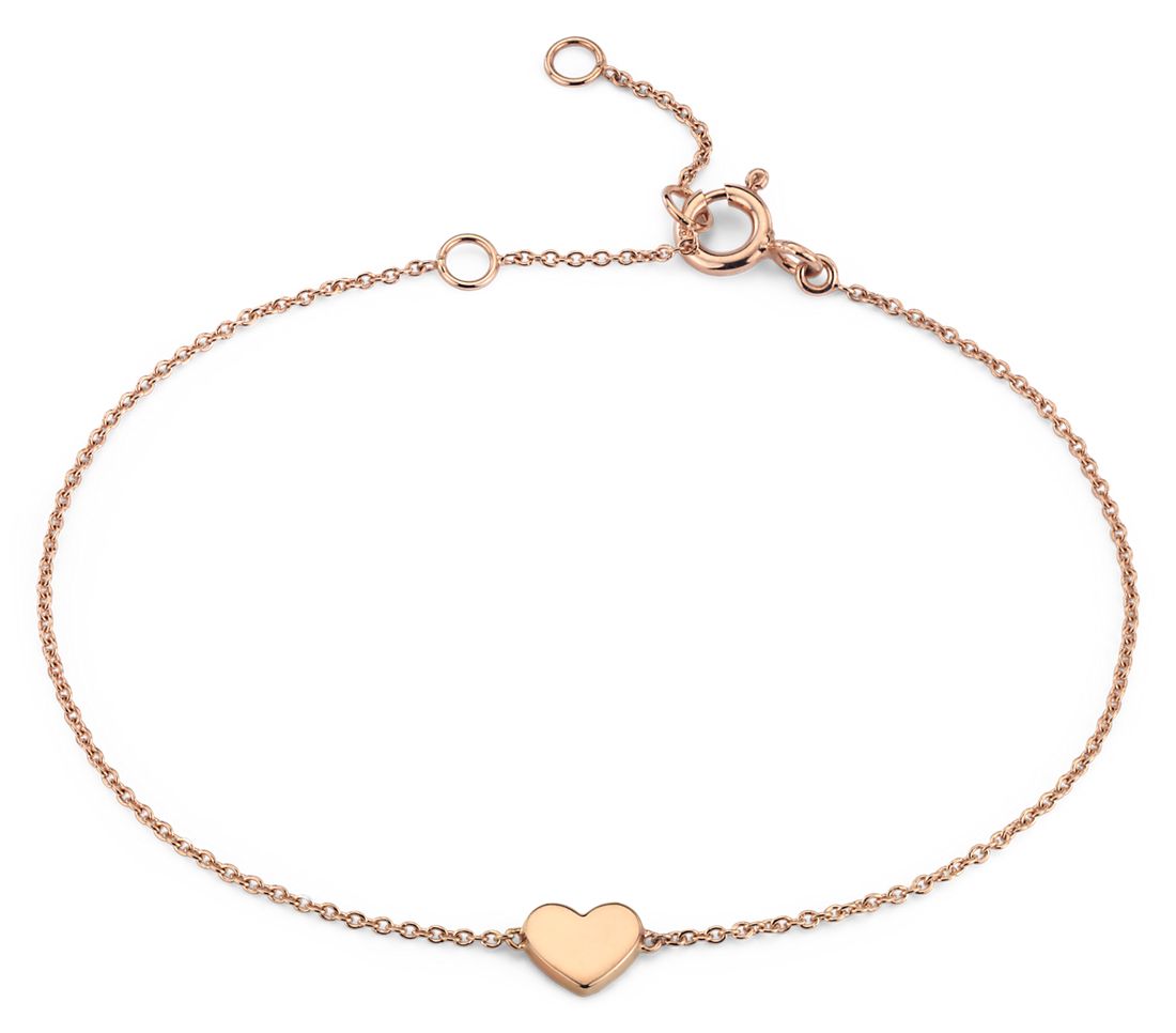 Rose gold bracelet with a small heart accent 