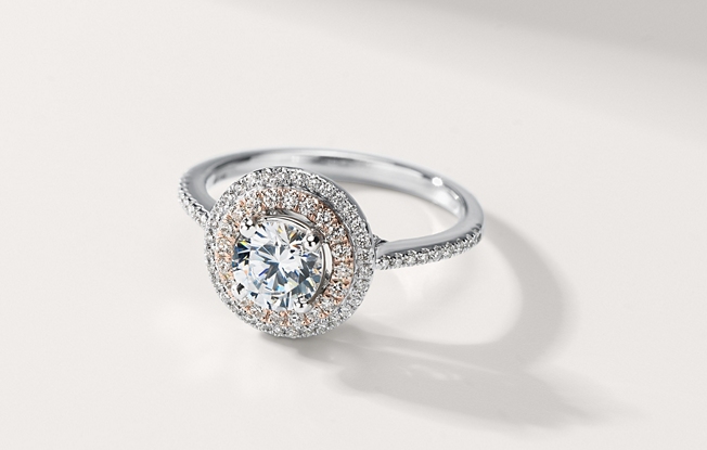 Diamond halo engagement ring.