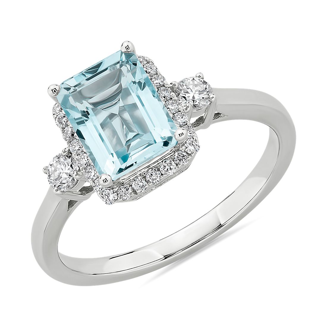 Aquamarine ring with diamond halo