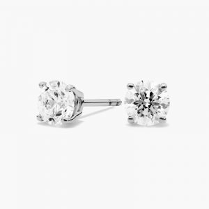 A pair of diamond stud earrings