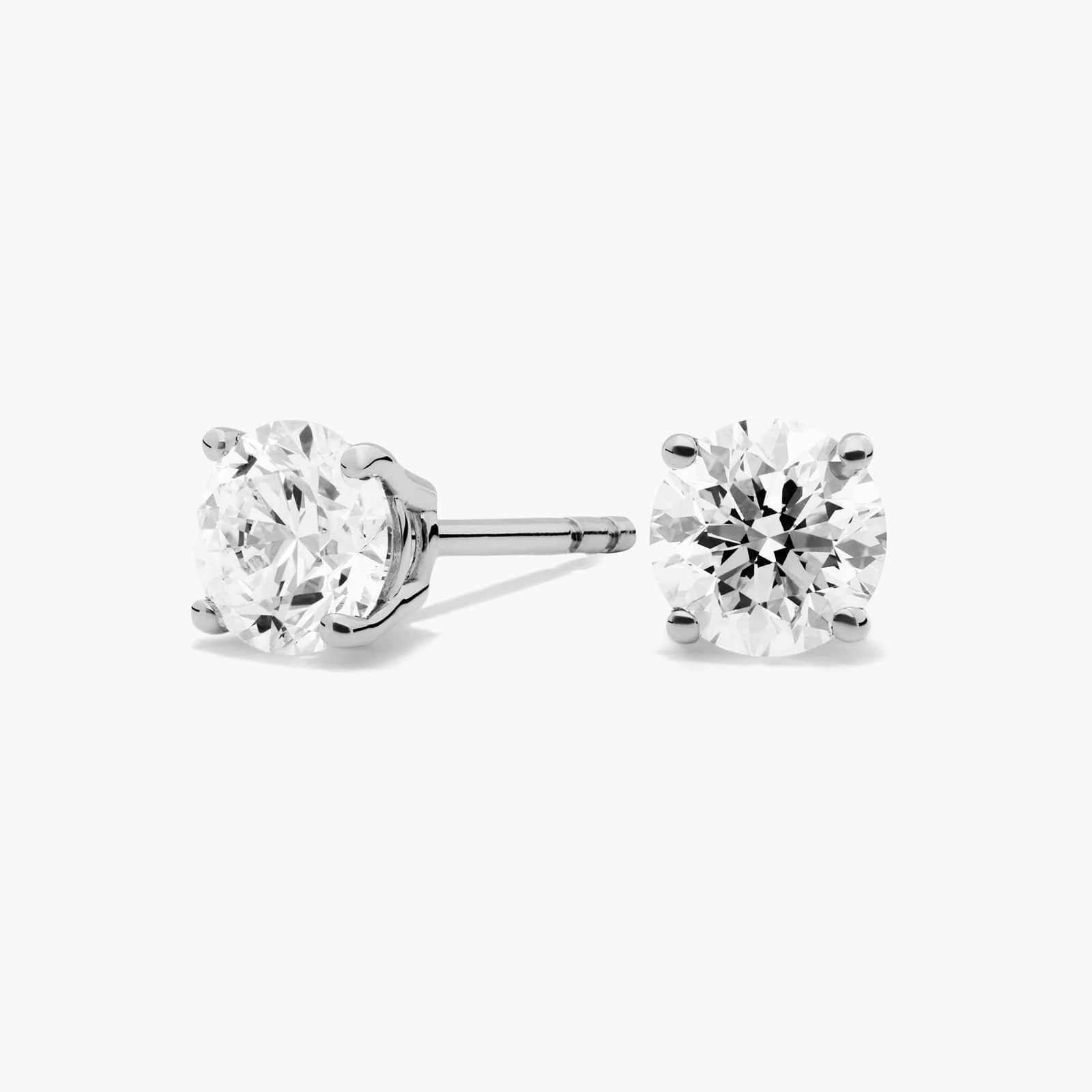A pair of diamond stud earrings