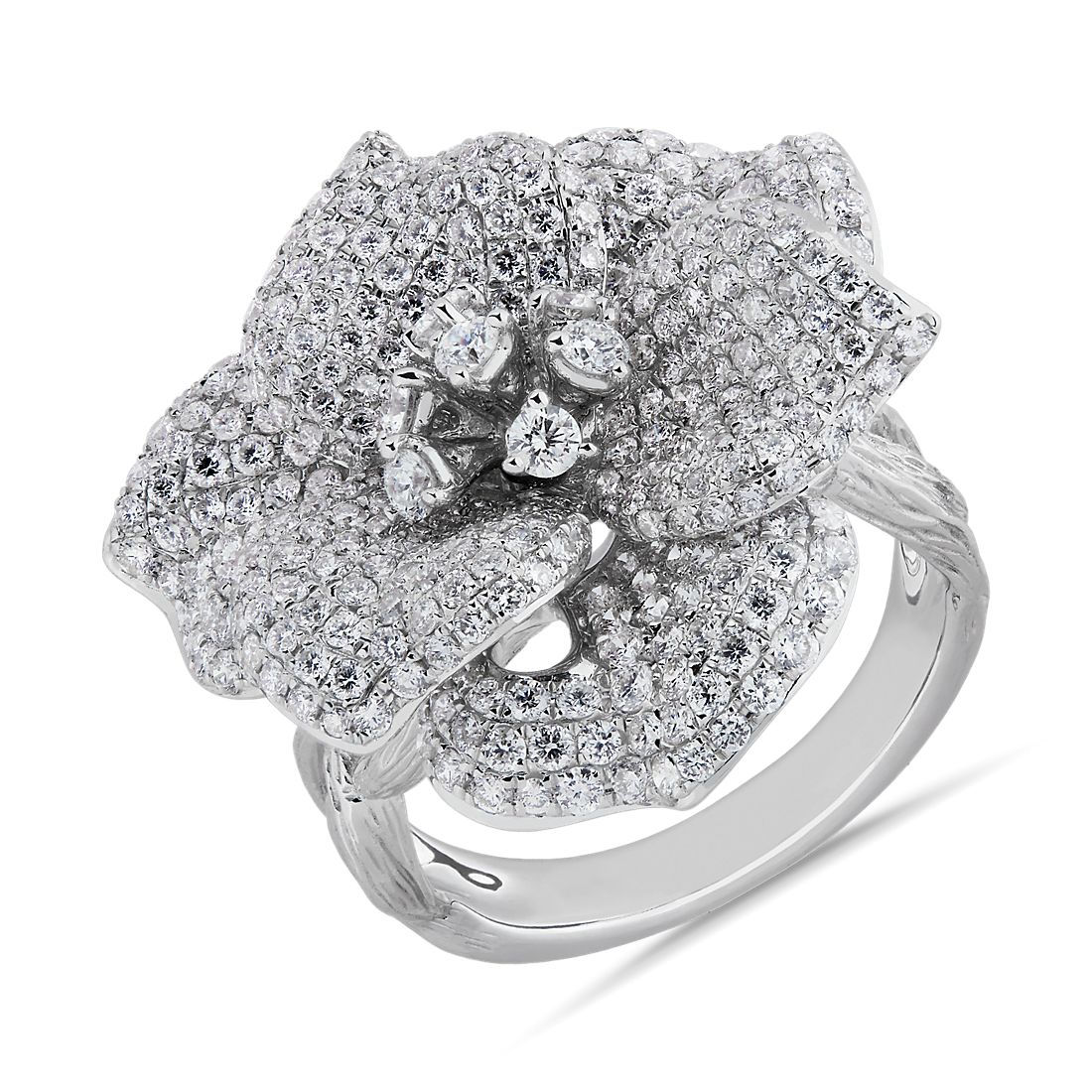 Diamond cluster ring in the shape of a flower.