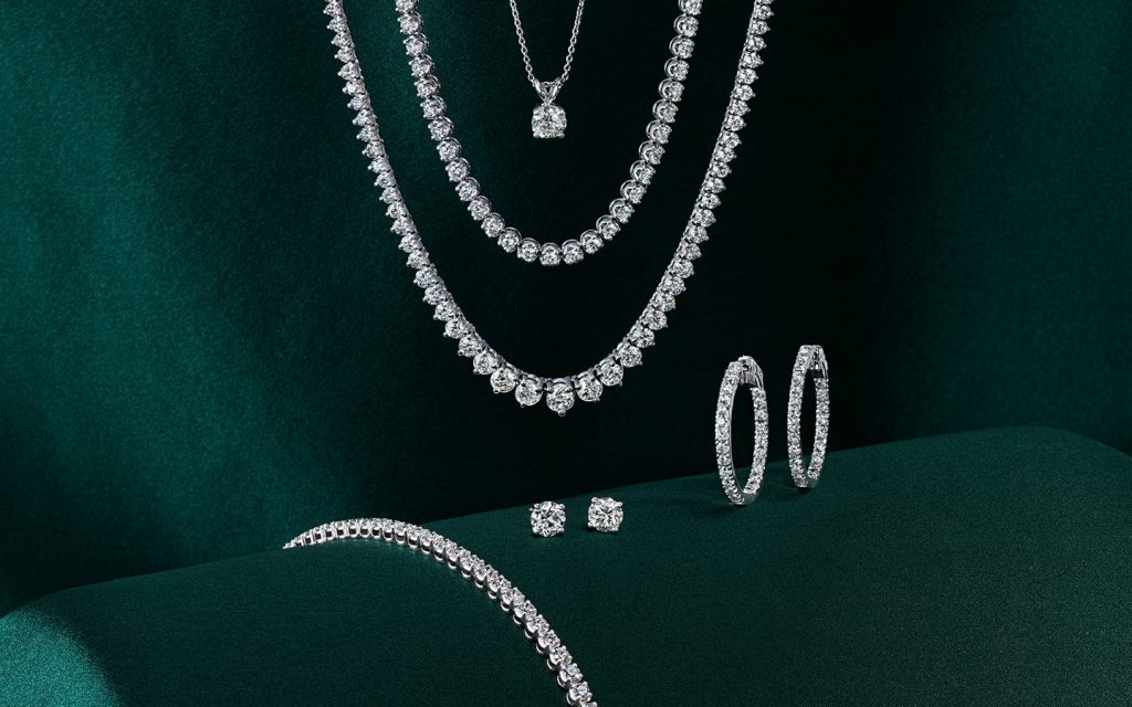 14k white gold and diamond necklaces, earrings and bracelet.