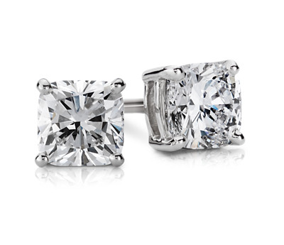 Diamond stud earrings on a white background