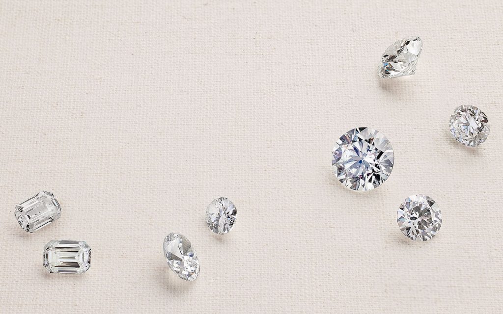 Loose diamonds in shapes such as round, oval and emerald.