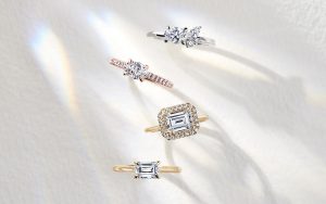East west setting engagement rings in white gold, rose gold and yellow gold with various diamond shapes.