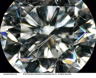 Close up of diamond twinning wisp inclusions 
