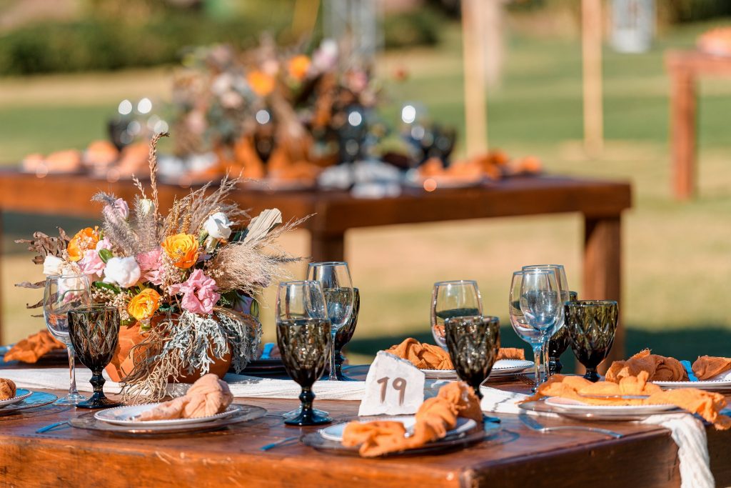 Photo of tables set up for an outdoor wedding.