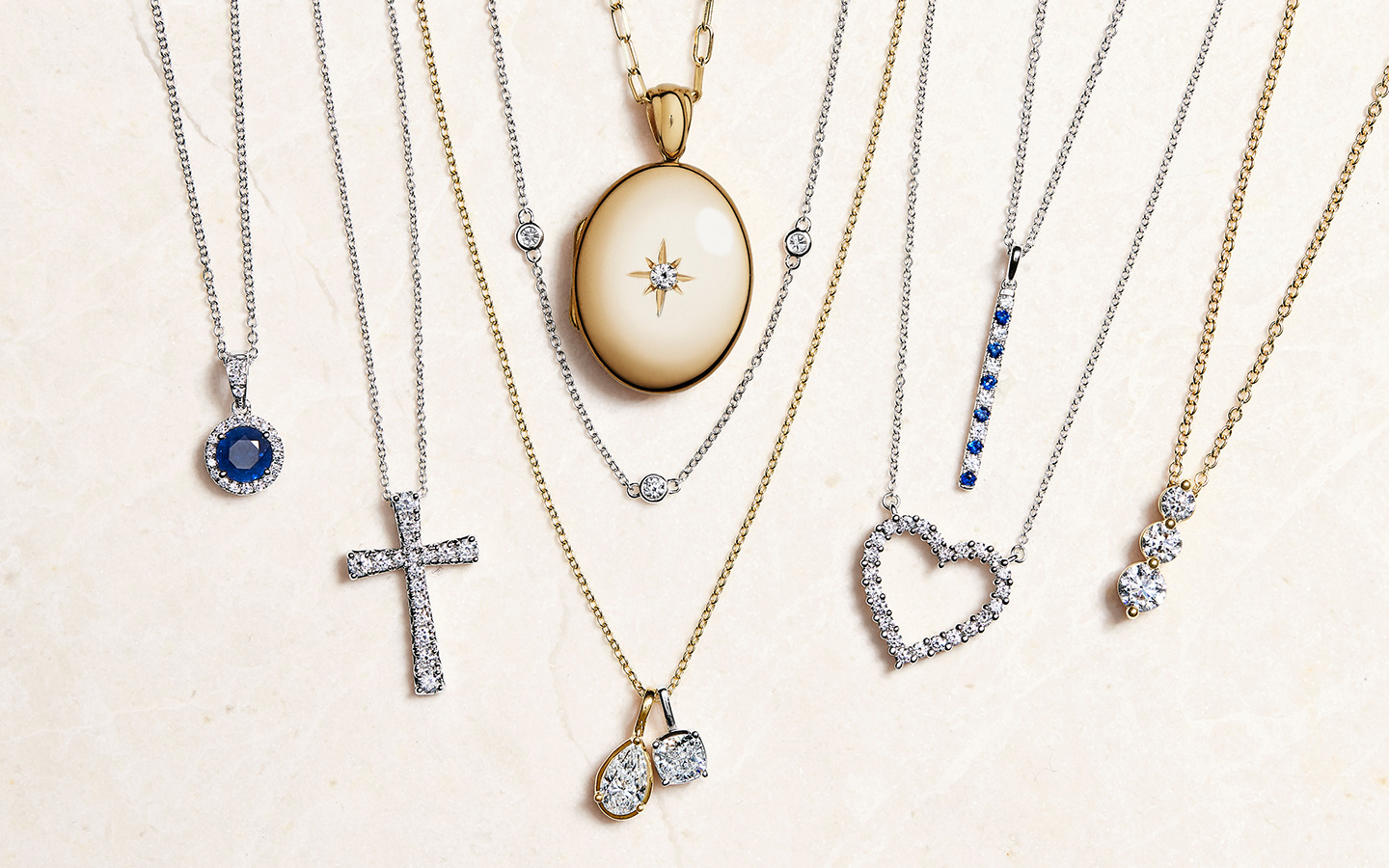 Blue Nile necklaces including gemstone and diamond necklaces in yellow and white gold. 