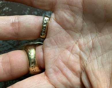 Mejia’s ring hand-inscribed with LOVE