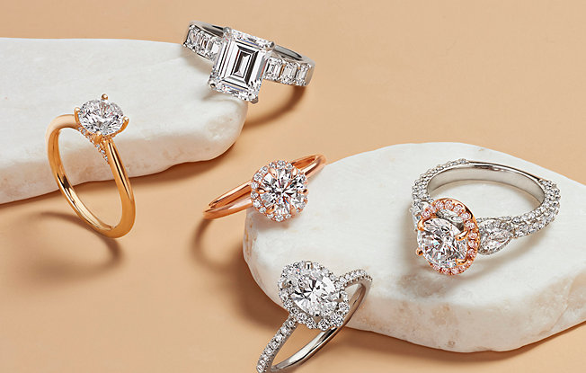 Engagement rings in gold, platinum and yellow gold.