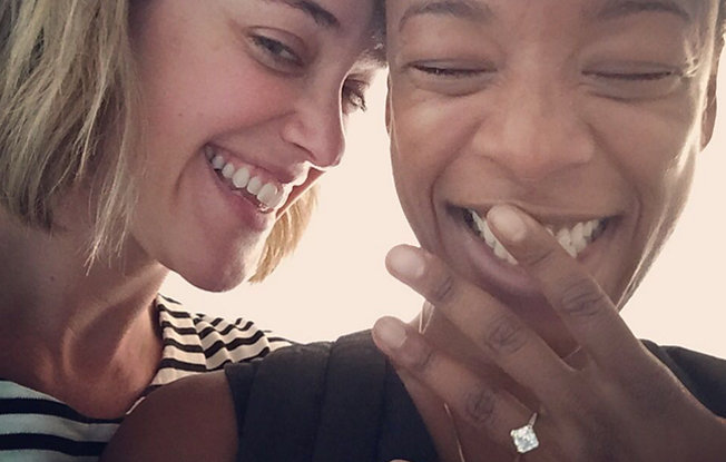 Samar Wiley and her partner show off her diamond and yellow gold engagement ring