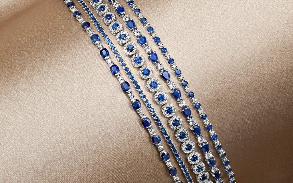 Sapphires and diamond tennis bracelets with blue sapphires.