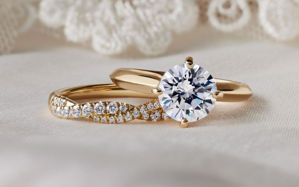 Yellow gold and diamond wedding band and engagement ring.