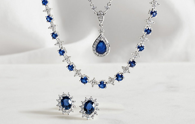 Blue sapphire and diamond jewelry including necklaces and earrings 