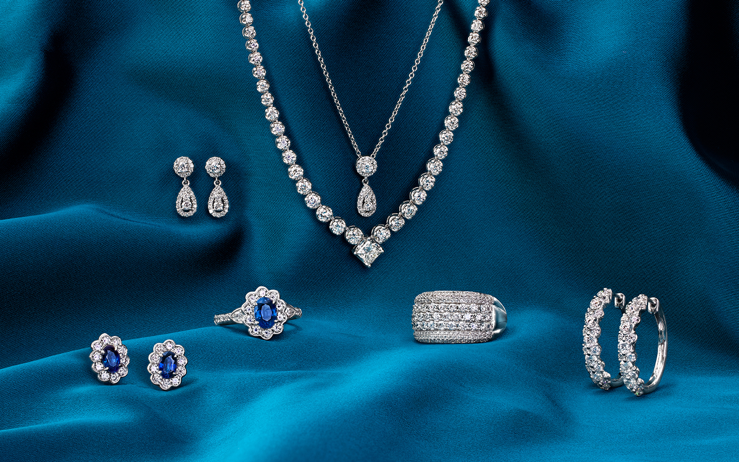 Timeless jewelry with diamond necklaces, earrings and sapphire rings.