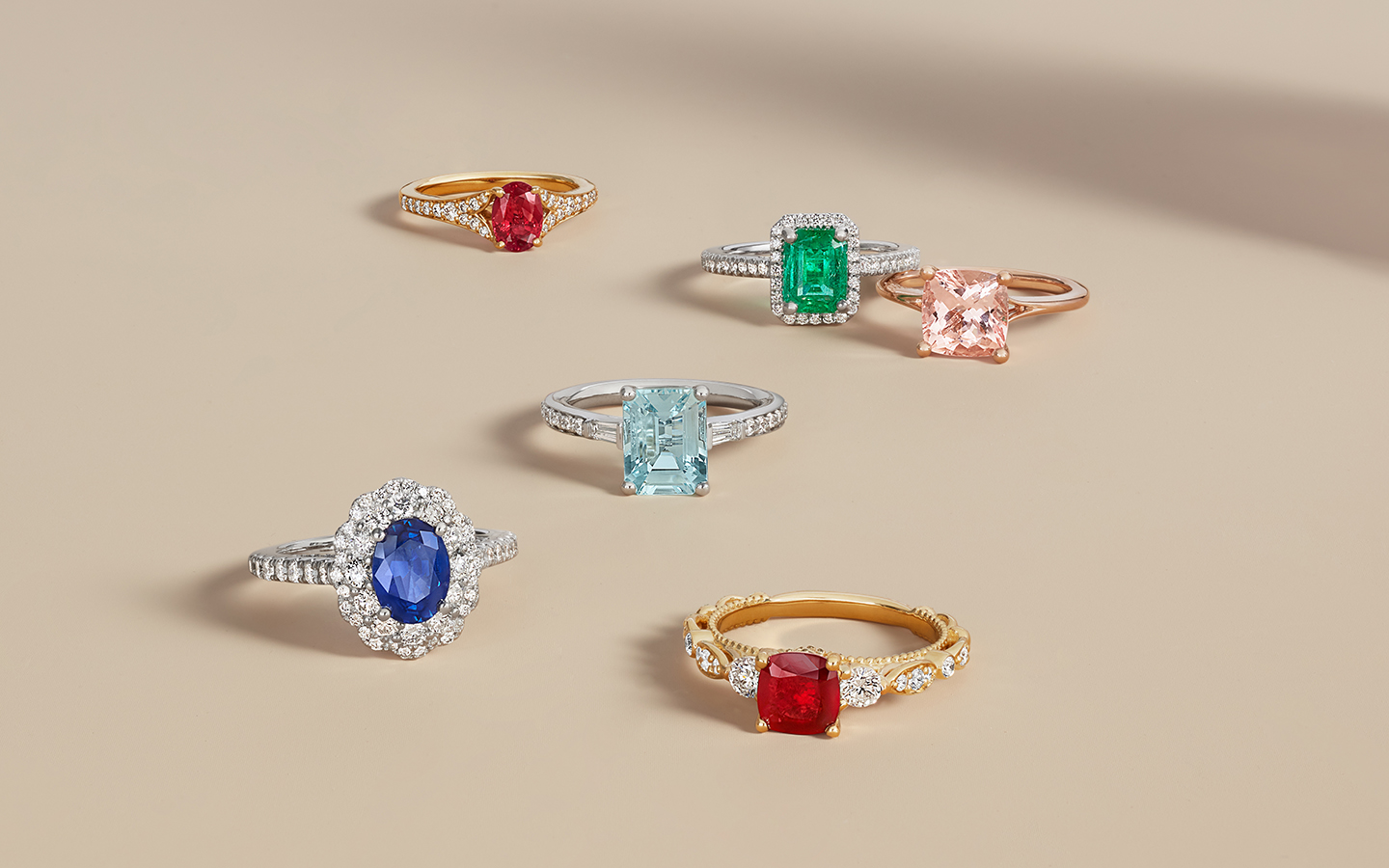 Six gemstone unique engagement rings with ruby, sapphire and emerald.