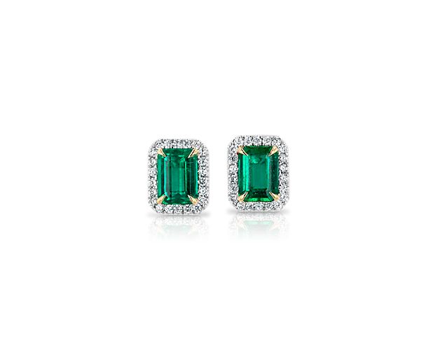 Emerald cut green gemstone stud earrings with diamonds. 