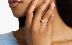 Person wearing a cushion cut ring