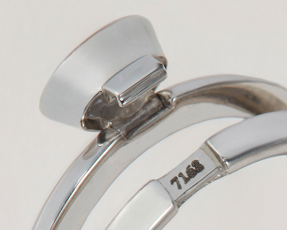 A detail shot of the clasp of Aaron’s ‘DiMe Siempre’ ring for Ten/Ten.