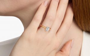 Close up of an emerald cut diamond ring