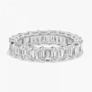 Side view of an emerald cut lab-grown diamond eternity ring