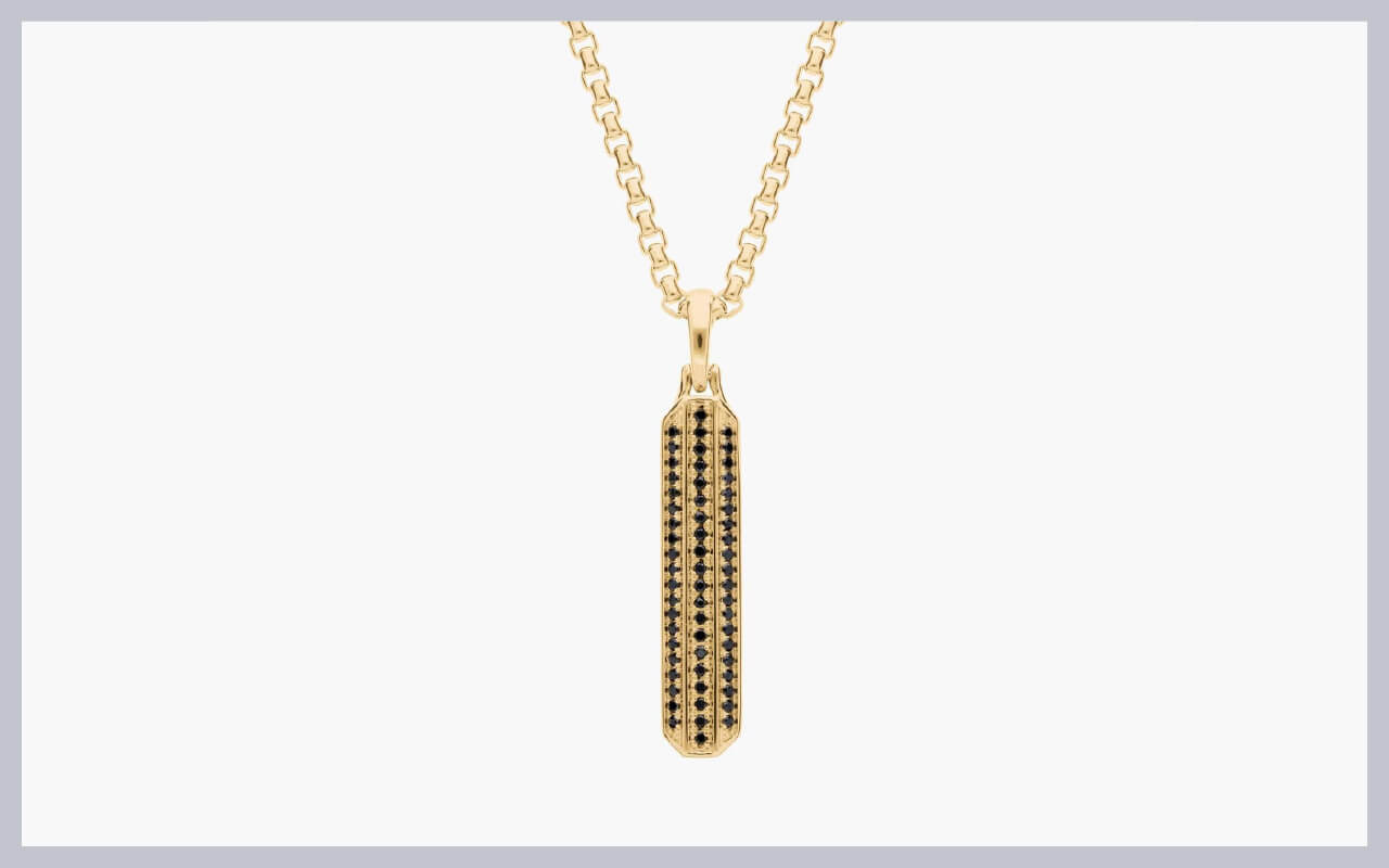 A 14K black spinel dog tag with round box chain