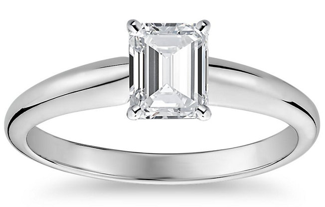 A classic simple solitaire engagement ring in 14k White Gold from Blue Nile on a white background