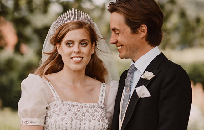 Princess Beatrice wearing the Queen Mary's fringe tiara with her husband on their wedding day