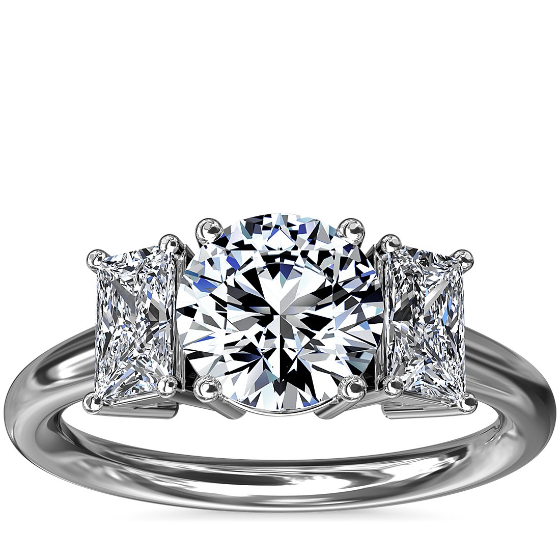 Three-stone diamond engagement ring with a round diamond in the middle 