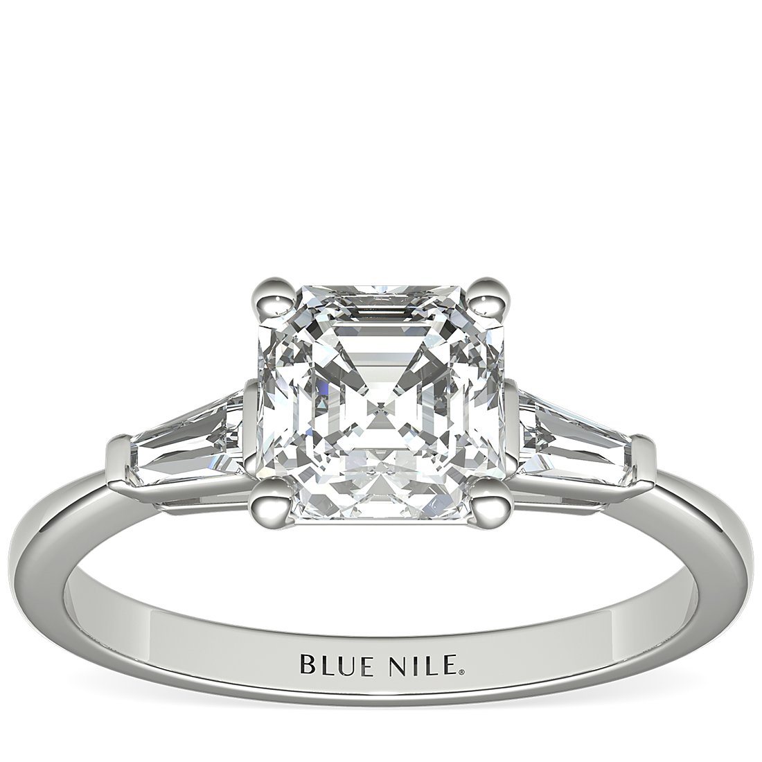 Three-stone diamond engagement ring