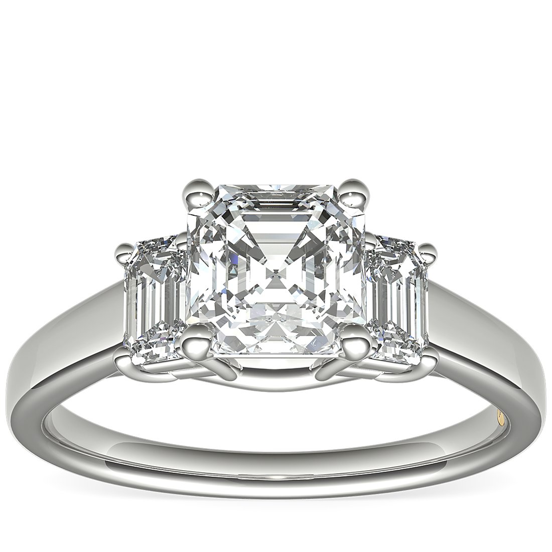 Three-stone diamond engagement ring