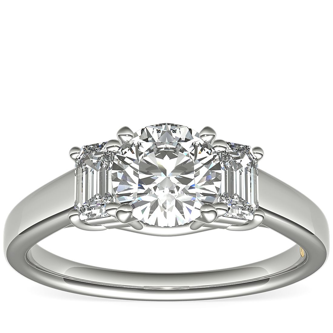 Three-stone diamond and white gold engagement ring