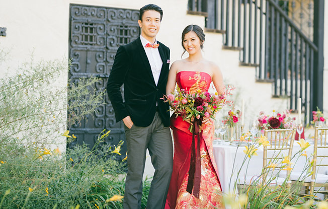 A couple in traditional chinese wedding attire at their wedding ceremony