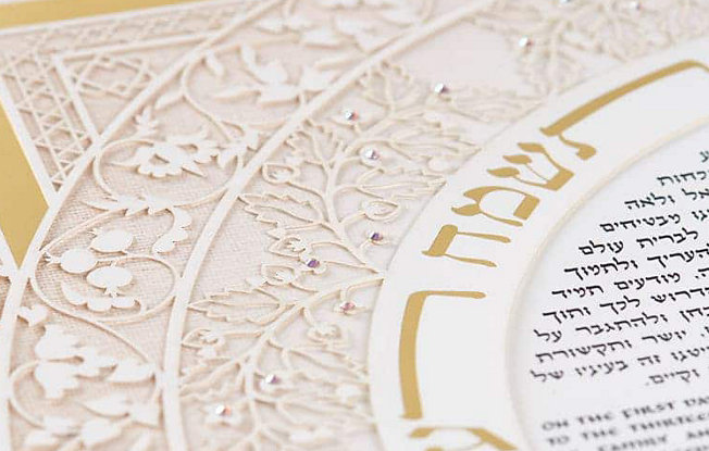 An ornate wood and gold ketubah